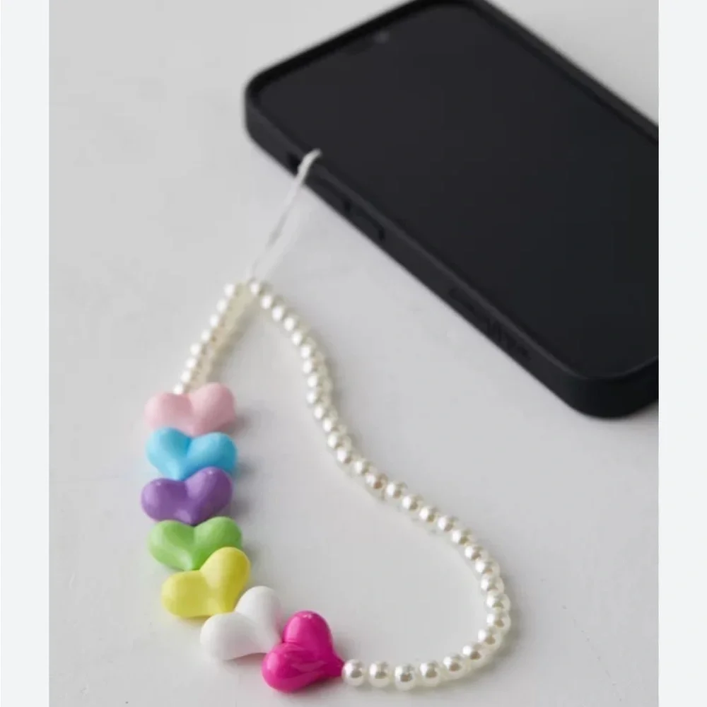 NWT Urban Outfitters Pearl Heart Phone Sling